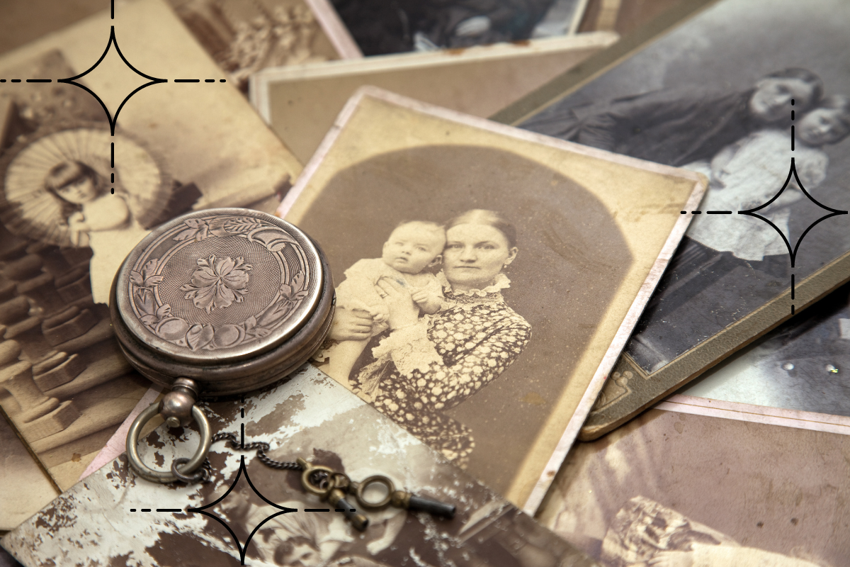 ancestor work, ancestral healing, old photos spread out on a table with a watch show the people who have come and gone before us to make us who we are today